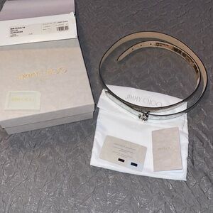 Brand new Jimmy Choo belt silver hardware and silver strap size is 110